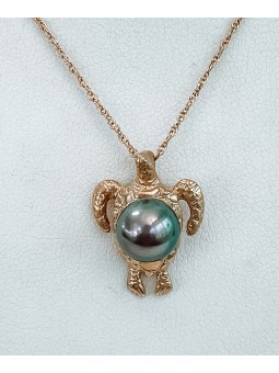 Pendentif tortue en Or...